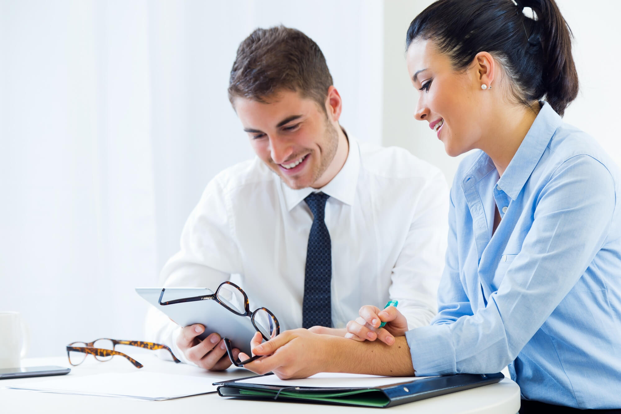 Professionals collaborating on insurance coverage options